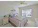 Bright bedroom with a comfortable bed and plenty of natural light at 4330 Pinebrook Circle # Apt 9, Bradenton, FL 34209