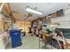 Overstuffed garage with shelving and workbench at 434 63Rd St, Holmes Beach, FL 34217