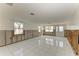 Spacious living area with white tile floors and walls that are under construction at 434 63Rd St, Holmes Beach, FL 34217