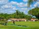 Golfer practices their swing at the driving range at 4495 Longmeadow # 77, Sarasota, FL 34235