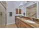 Double vanity bathroom with granite countertop at 500 San Lino Cir # 511, Venice, FL 34292
