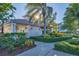 Community clubhouse with landscaping and a walkway at 500 San Lino Cir # 511, Venice, FL 34292