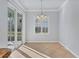 Bright dining room with tile floors and access to a patio at 500 San Lino Cir # 511, Venice, FL 34292