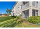 Building exterior showcasing landscaping and water views at 500 San Lino Cir # 511, Venice, FL 34292