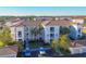 Two-story condo building with balconies and attached garages at 500 San Lino Cir # 511, Venice, FL 34292