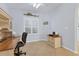 Bright home office features built-in shelving and wood desk at 500 San Lino Cir # 511, Venice, FL 34292