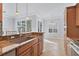 Kitchen offers granite countertops, stainless steel appliances, and a breakfast bar at 500 San Lino Cir # 511, Venice, FL 34292