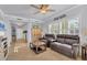 Comfortable living room with leather seating and open floor plan at 500 San Lino Cir # 511, Venice, FL 34292
