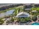 Overhead view of the Bahama Bar with surrounding lush landscaping, pool and water feature at 5397 Bartolomeo St, Sarasota, FL 34238