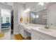 Bright bathroom with double vanity and access to bedroom at 5397 Bartolomeo St, Sarasota, FL 34238