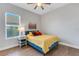 Cozy bedroom with a queen bed and wood flooring at 5397 Bartolomeo St, Sarasota, FL 34238