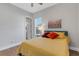 Charming bedroom with queen bed, wood floors, and natural light at 5397 Bartolomeo St, Sarasota, FL 34238