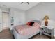 Bedroom with queen bed and double doors at 5397 Bartolomeo St, Sarasota, FL 34238
