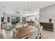 Open concept dining room with kitchen and living room views at 5397 Bartolomeo St, Sarasota, FL 34238