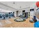 Well-equipped gym with state-of-the-art exercise machines and a spacious workout area at 5397 Bartolomeo St, Sarasota, FL 34238