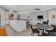 Modern kitchen with large island and breakfast bar at 5397 Bartolomeo St, Sarasota, FL 34238