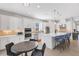 Modern kitchen with white cabinets and stainless steel appliances at 5397 Bartolomeo St, Sarasota, FL 34238