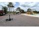 Community playground featuring modern equipment and a safe, cushioned play surface at 5397 Bartolomeo St, Sarasota, FL 34238