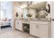 Spa-like bathroom with double vanity and view of bedroom at 6226 Plateau Ct, Bradenton, FL 34203