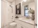 Clean bathroom with tub, toilet and vanity at 6226 Plateau Ct, Bradenton, FL 34203