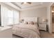 Spacious bedroom with a king-size bed and white dresser at 6226 Plateau Ct, Bradenton, FL 34203