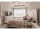 Spacious bedroom with a king-size bed and white dresser at 6226 Plateau Ct, Bradenton, FL 34203