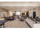 Spacious community room with seating and game tables at 6226 Plateau Ct, Bradenton, FL 34203