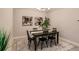 Elegant dining room with dark wood table and chandelier at 6226 Plateau Ct, Bradenton, FL 34203