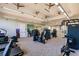 Fitness center with strength training equipment and TV at 6226 Plateau Ct, Bradenton, FL 34203