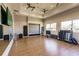 Bright fitness center with various equipment and large mirrors at 6226 Plateau Ct, Bradenton, FL 34203