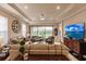 Bright and airy living room with comfortable seating and large windows at 6226 Plateau Ct, Bradenton, FL 34203
