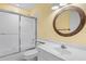 Simple bathroom with tub/shower and modern vanity at 6640 Pineview Ter # 6640, Bradenton, FL 34203