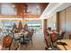 Clubhouse dining area with tables, chairs, and views of the golf course at 6640 Pineview Ter, Bradenton, FL 34203