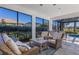 Relaxing screened-in patio with pool and seating area at 6750 Alstead Cir, Lakewood Ranch, FL 34202