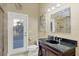 Bathroom with granite vanity, private access, and tiled floors at 7041 Beechmont Ter, Lakewood Ranch, FL 34202