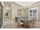 Formal dining room with a light and airy feel, perfect for entertaining at 7041 Beechmont Ter, Lakewood Ranch, FL 34202