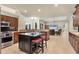 Gourmet kitchen with island, stainless steel appliances, and ample cabinetry at 7041 Beechmont Ter, Lakewood Ranch, FL 34202