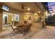 Outdoor patio with dining area and built-in grill at 7041 Beechmont Ter, Lakewood Ranch, FL 34202
