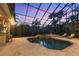 Relaxing pool and spa area with screened enclosure at 7041 Beechmont Ter, Lakewood Ranch, FL 34202