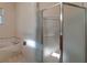 Bathroom with a large walk-in shower and frosted glass door at 7156 Rue De Palisades # 3, Sarasota, FL 34238