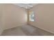 Spacious bedroom with neutral walls and carpet flooring at 7156 Rue De Palisades # 3, Sarasota, FL 34238