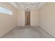 Primary bedroom with ceiling fan and access to bathroom and closet at 7156 Rue De Palisades # 3, Sarasota, FL 34238
