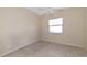 Simple bedroom with tiled floor and ceiling fan at 7156 Rue De Palisades # 3, Sarasota, FL 34238