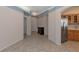 Bright entryway with tile floors and dark wood console table at 7156 Rue De Palisades # 3, Sarasota, FL 34238