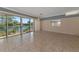Gathering room featuring tile floors and lake view at 7156 Rue De Palisades # 3, Sarasota, FL 34238