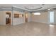 Spacious living room with tile floors and two-tone paint at 7156 Rue De Palisades # 3, Sarasota, FL 34238
