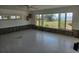 Large living room with waterfront view, under renovation at 7322 Westmoreland Dr, Sarasota, FL 34243