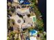 An aerial view showcasing the home, circular driveway, and pool at 7618 Midnight Pass Rd, Sarasota, FL 34242