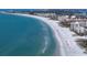 Scenic Crescent Beach with white sand and turquoise waters at 7618 Midnight Pass Rd, Sarasota, FL 34242
