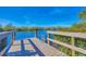 Dock with water access, perfect for boating and fishing at 7618 Midnight Pass Rd, Sarasota, FL 34242